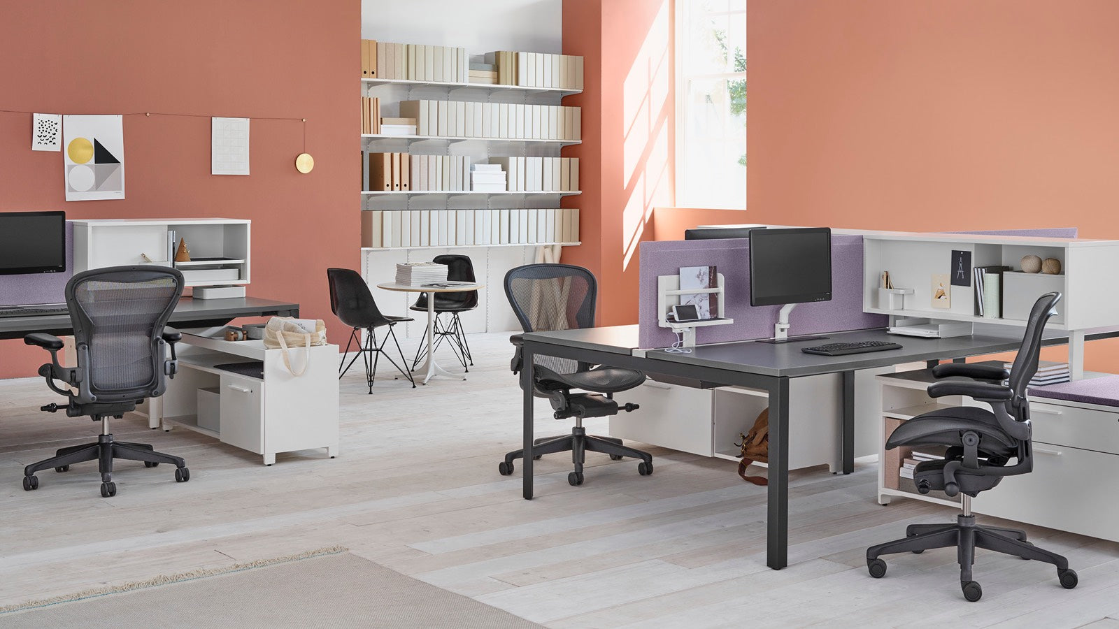 Modern office setup with desks and ergonomic chairs — OfficeGoods hero banner