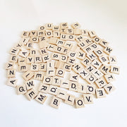 Wooden Scrabble Tiles with Black Letters