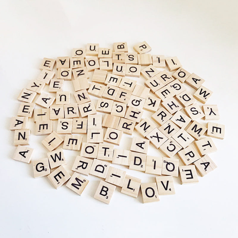 Wooden Scrabble Tiles with Black Letters