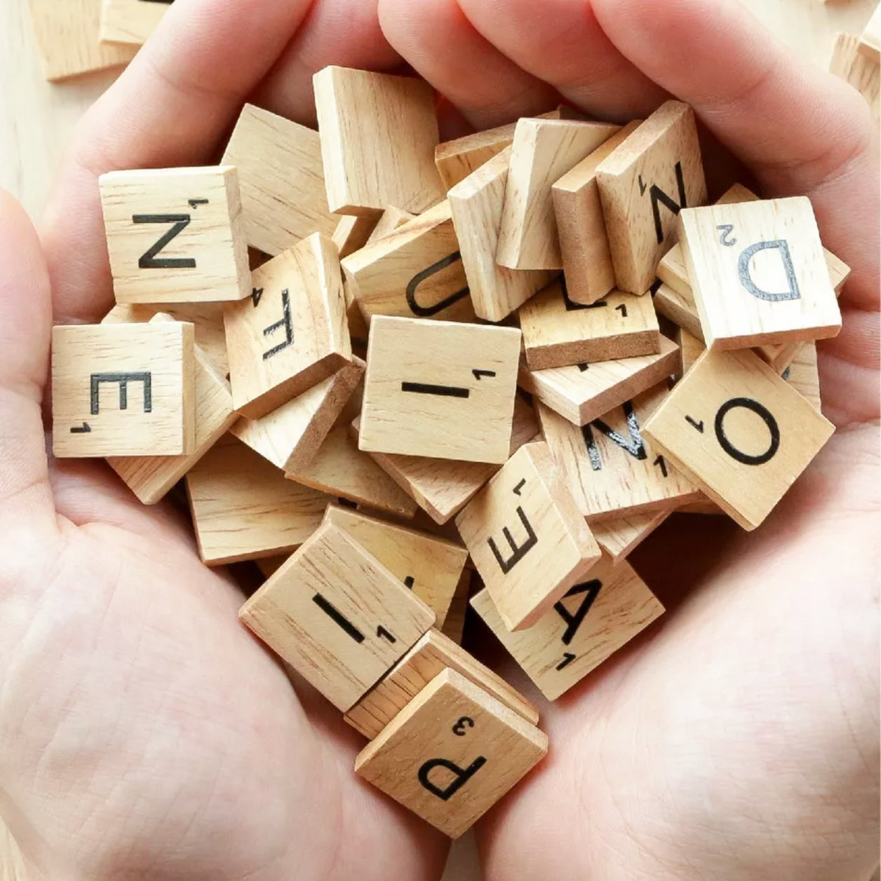 Wooden Scrabble Tiles with Black Letters